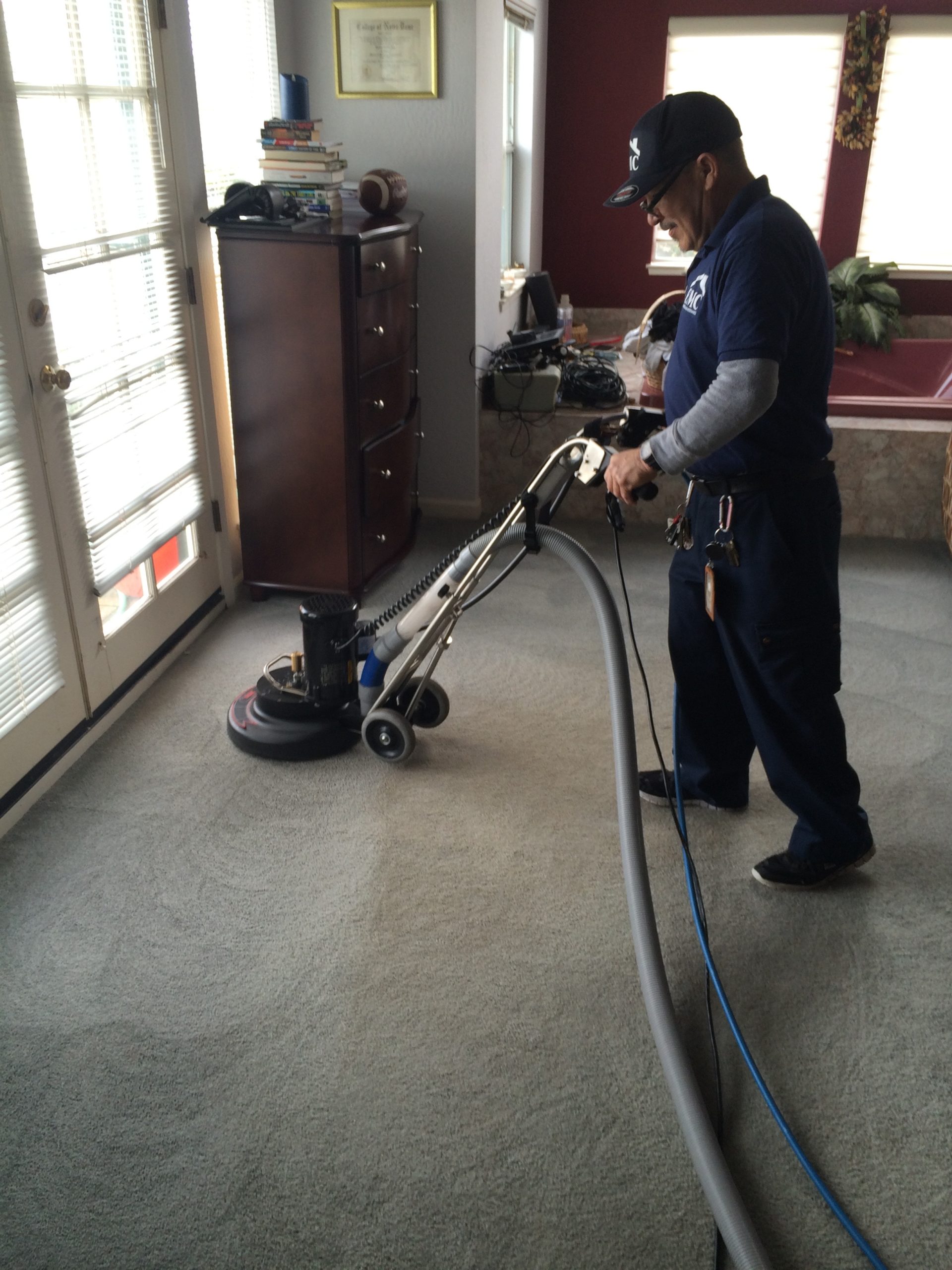 Man cleaning carpet